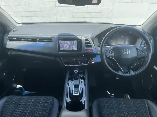 ホンダ ヴェゼル ハイブリッド Z 長崎県 2014(平26)年 11.6万km ホワイトオーキッドパール (株)IDOMが運営する【じしゃロン長崎店】の自社ローン専用車両になりますこちらは現金またはオートローンご利用時の価格です。自社ローンご希望の方は別途その旨お申付け下さい/ナビ　/バックカメラ　/ハーフレザーシート　/シートヒーター　/クルーズコントロール　/衝突被害軽減ブレーキ　/ＬＥＤヘッドライト　/オートライト　/パドルシフト　/ＥＴＣ　/コーナーセンサー　/プッシュスタート/スマートキー/電格ミラー