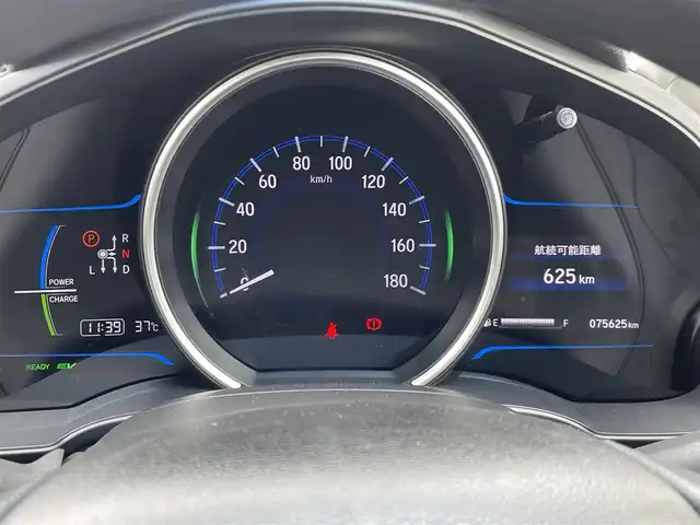 ホンダ フィット ハイブリット Fパッケージ 福岡県 2016(平28)年 7.6万km プレミアムホワイトパールⅡ 純正ナビ（ＶＸＭ－１６４ＣＳｉ）/ワンセグTV/CD/BT/SD/バックカメラ/衝突軽減/前後ドラレコ/スマートキー/プッシュスタート/ＥＴＣ/ステアリングリモコン/社外アルミ/ドアバイザー/オートエアコン