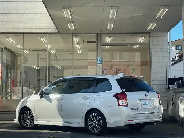 トヨタ カローラ フィールダー HV G エアロツアラー W×B 愛知県 2015(平27)年 11.1万km ホワイトパールクリスタルシャイン /当店買取/禁煙/TRDフロントエアロ//純正ナビNSZN-W64T/バックカメラ//フルセグTV/CD/SD/Bluetooth/DVD//社外ガングリップステアリング//社外マフラーガナドール//社外16AW//HID/Aライト/ハーフレザー//SRSカーテンエアバック//ISOFIX/純正Fマット/ドアバイザー//保証書/取説/ナビ取説/スマートキー//エアロ/ドラレコ
