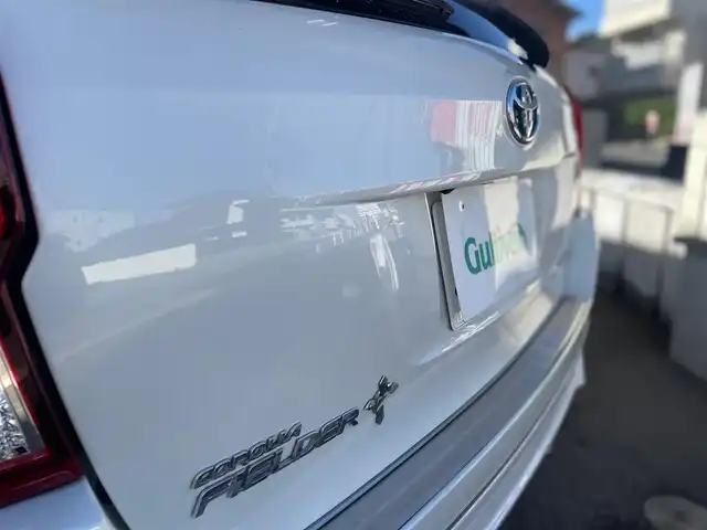 トヨタ カローラ フィールダー HV G エアロツアラー W×B 愛知県 2015(平27)年 11.1万km ホワイトパールクリスタルシャイン /当店買取/禁煙/TRDフロントエアロ//純正ナビNSZN-W64T/バックカメラ//フルセグTV/CD/SD/Bluetooth/DVD//社外ガングリップステアリング//社外マフラーガナドール//社外16AW//HID/Aライト/ハーフレザー//SRSカーテンエアバック//ISOFIX/純正Fマット/ドアバイザー//保証書/取説/ナビ取説/スマートキー//エアロ/ドラレコ