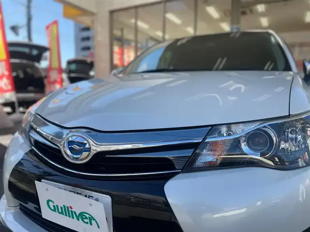 トヨタ カローラ フィールダー HV G エアロツアラー W×B 愛知県 2015(平27)年 11.1万km ホワイトパールクリスタルシャイン /当店買取/禁煙/TRDフロントエアロ//純正ナビNSZN-W64T/バックカメラ//フルセグTV/CD/SD/Bluetooth/DVD//社外ガングリップステアリング//社外マフラーガナドール//社外16AW//HID/Aライト/ハーフレザー//SRSカーテンエアバック//ISOFIX/純正Fマット/ドアバイザー//保証書/取説/ナビ取説/スマートキー//エアロ/ドラレコ