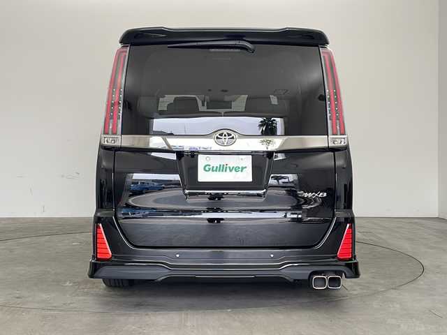 トヨタ ノア Si ダブルバイビーⅡ 兵庫県 2019(令1)年 2.3万km ブラック ・純正9インチナビ&TV&CD&DVD&BT&HDMI&SD/・純正12.1インチフリップダウンモニター/・両側パワースライドドア/・純正プレミアムサウンドシステム/・モデリスタ(フロント・サイド・リア)/・トヨタセーフティセンス/・プリクラッシュセーフティ/・レーンディパーチャーアラート/・クリアランスソナー/・オートマチックハイビーム/・LEDヘッドライト/・RAYS 18インチAW/・社外パーフェクトダンパー５Gスペシャル/・全長式車高調キット/・BRITZ スロットルコントローラー/・ルームミラー一体型レーダー探知機/・クルーズコントロール/・パーキングサポートブレーキ/・先行車発進告知/・ハーフレザーシート/・オットマン/・フォグランプ/・ビルトインETC2.0/・純正ドライブレコーダー/・プッシュスタート/・スペアキー/・ステアリングリモコン