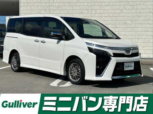 トヨタ ヴォクシー ハイブリッド ZS 煌Ⅲ 福岡県 2021(令3)年 2.5万km ホワイトパールクリスタルシャイン 純正10型メモリーナビ【フルセグTV・CD・DVD・HDMI】 バックモニター 後席モニター コーナーセンサー 両側パワスラ クルーズコントロール ドラレコ ビルトインETC2.0 シートヒーター スマートキー 純正LEDヘッドライト 純正フロアマット 純正アルミホイール プッシュスタート