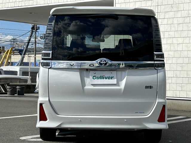 トヨタ ヴォクシー ハイブリッド ZS 煌Ⅲ 福岡県 2021(令3)年 2.5万km ホワイトパールクリスタルシャイン 純正10型メモリーナビ【フルセグTV・CD・DVD・HDMI】 バックモニター 後席モニター コーナーセンサー 両側パワスラ クルーズコントロール ドラレコ ビルトインETC2.0 シートヒーター スマートキー 純正LEDヘッドライト 純正フロアマット 純正アルミホイール プッシュスタート