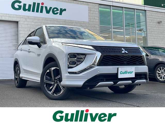 三菱 エクリプス クロス ＰＨＥＶ P 道東・釧路十勝 2021(令3)年 4.7万km ホワイトダイヤモンド 純正ナビ(AM/FM/BT/フルセグTV)/ハーフレザー/ドラレコ前後/積み込みタイヤ(スタッドレス)/ETC/アダプティブクルーズコントロール/衝突被害軽減システム/バッテリー冷却ファンスイッチ/バックカメラ/ステアリングヒーター/レーンアシスト/プラグインコンセント/横滑り防止/電格ミラー/シートヒーター前席/プッシュスタート