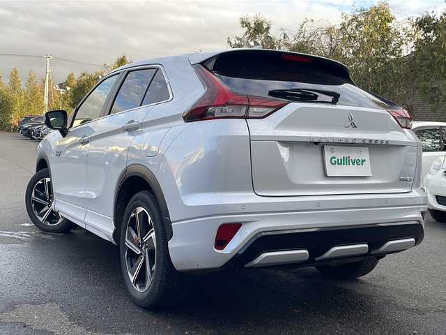 三菱 エクリプス クロス ＰＨＥＶ P 道東・釧路十勝 2021(令3)年 4.7万km ホワイトダイヤモンド 純正ナビ(AM/FM/BT/フルセグTV)/ハーフレザー/ドラレコ前後/積み込みタイヤ(スタッドレス)/ETC/アダプティブクルーズコントロール/衝突被害軽減システム/バッテリー冷却ファンスイッチ/バックカメラ/ステアリングヒーター/レーンアシスト/プラグインコンセント/横滑り防止/電格ミラー/シートヒーター前席/プッシュスタート