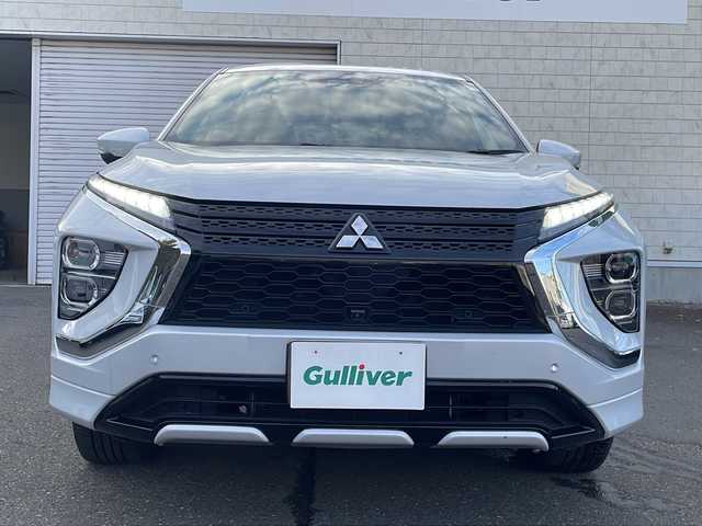 三菱 エクリプス クロス ＰＨＥＶ P 道東・釧路十勝 2021(令3)年 4.7万km ホワイトダイヤモンド 純正ナビ(AM/FM/BT/フルセグTV)/ハーフレザー/ドラレコ前後/積み込みタイヤ(スタッドレス)/ETC/アダプティブクルーズコントロール/衝突被害軽減システム/バッテリー冷却ファンスイッチ/バックカメラ/ステアリングヒーター/レーンアシスト/プラグインコンセント/横滑り防止/電格ミラー/シートヒーター前席/プッシュスタート