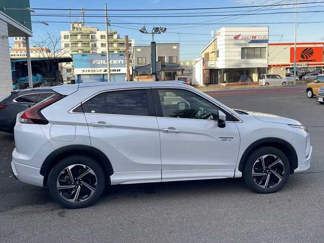 三菱 エクリプス クロス ＰＨＥＶ P 道東・釧路十勝 2021(令3)年 4.7万km ホワイトダイヤモンド 純正ナビ(AM/FM/BT/フルセグTV)/ハーフレザー/ドラレコ前後/積み込みタイヤ(スタッドレス)/ETC/アダプティブクルーズコントロール/衝突被害軽減システム/バッテリー冷却ファンスイッチ/バックカメラ/ステアリングヒーター/レーンアシスト/プラグインコンセント/横滑り防止/電格ミラー/シートヒーター前席/プッシュスタート