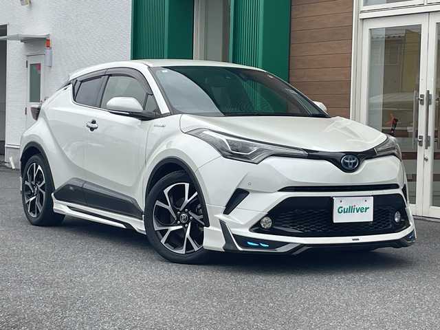 トヨタ Ｃ－ＨＲ G 岐阜県 2018(平30)年 11.4万km ホワイトパールクリスタルシャイン 禁煙車/純正SDナビ/フルセグTV/Bluetooth/ブラインドスポットモニター/クルーズコントロール/ABS/前後コーナーセンサー/レーンキープアシスト/盗難防止装置/Wサイドエアバック/カーテンエアバック/LEDヘッドライト/オートハイビーム/モデリスタエアロ/ビルトインETC/純正アルミホイール/パワーステアリング/パワーウィンドウ/ステアリングスイッチ/ドライブレコーダー/スマートキー/Pスタート/社外AW積み込み