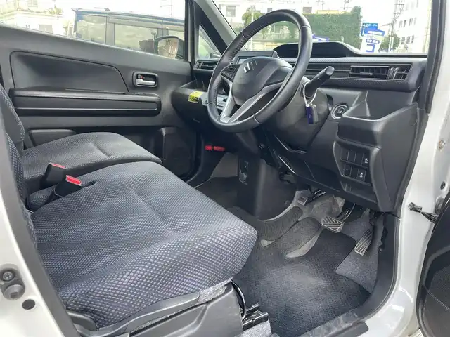 スズキ ワゴンＲ HYBRID FZ 沖縄県 2017(平29)年 6.8万km ピュアホワイトP (株)IDOMが運営する【じしゃロンコザ店】の自社ローン専用車両になりますこちらは現金またはオートローンご利用時の価格です。自社ローンご希望の方は別途その旨お申付け下さい/社外ナビ　/TV　/ETC　/アイドリングストップ/シートヒーター　/CD再生　/プッシュスタート　/スマートキー　/オートライト　/フロアマット　/純正アルミホイール　/パワーステアリング　/パワーウィンドウ