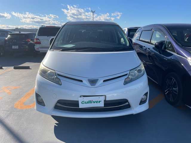 トヨタ エスティマ アエラス Gエディション 神奈川県 2011(平23)年 4.1万km ホワイトパールクリスタルシャイン ツインムーンルーフ/純正HDDナビゲーション【NHZN-W60G】/純正フリップダウンモニター【V9T-R59C　３TV26】/フルセグ　CD DVD　HDD　AM FM　AUX SD/バックカメラ/両側電動スライドドア/クルーズコントロール/純正ビルトインETC/木目調/革コンビステアリング/リアクーラー/プッシュスタート/スマートキー/HIDヘッドランプ/フロントフォグランプ/オートラート/純正サイド/リアスポイラー/純正１７インチアルミホイール/電格ウインカーミラー