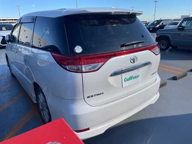 トヨタ エスティマ アエラス Gエディション 神奈川県 2011(平23)年 4.1万km ホワイトパールクリスタルシャイン ツインムーンルーフ/純正HDDナビゲーション【NHZN-W60G】/純正フリップダウンモニター【V9T-R59C　３TV26】/フルセグ　CD DVD　HDD　AM FM　AUX SD/バックカメラ/両側電動スライドドア/クルーズコントロール/純正ビルトインETC/木目調/革コンビステアリング/リアクーラー/プッシュスタート/スマートキー/HIDヘッドランプ/フロントフォグランプ/オートラート/純正サイド/リアスポイラー/純正１７インチアルミホイール/電格ウインカーミラー