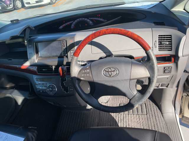 トヨタ エスティマ アエラス Gエディション 神奈川県 2011(平23)年 4.1万km ホワイトパールクリスタルシャイン ツインムーンルーフ/純正HDDナビゲーション【NHZN-W60G】/純正フリップダウンモニター【V9T-R59C　３TV26】/フルセグ　CD DVD　HDD　AM FM　AUX SD/バックカメラ/両側電動スライドドア/クルーズコントロール/純正ビルトインETC/木目調/革コンビステアリング/リアクーラー/プッシュスタート/スマートキー/HIDヘッドランプ/フロントフォグランプ/オートラート/純正サイド/リアスポイラー/純正１７インチアルミホイール/電格ウインカーミラー