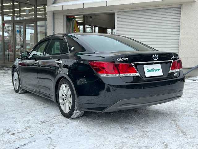 トヨタ クラウン ハイブリッド アスリートS 道東・釧路十勝 2013(平25)年 12.3万km プレシャスブラックパール 寒冷地仕様/純正ナビ/　　（DVD/CD/フルセグTV/Bluetooth）/バックカメラ/クルーズコントロール/前席パワーシート/前席シートヒーター/ハンドルヒーター/HIDヘッドライト/フォグライト/ミラーヒーター/ウィンカーミラー/電動格納ミラー/革巻きステアリング/ステアリングリモコン/横滑り防止装置/コーナーセンサー/ドライブレコーダー/電動チルト＆テレスコピックステアリング/純正ドアバイザー/純正フロアマット/ディーラー記録簿 H30/R2/4/6/スマートキー/エンジンプッシュスタート/スペアキー/取扱説明書/保証書/純正17インチアルミホイール/夏タイヤ積み込み /　　（215/55R17、5mm、純正AW）