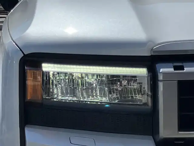 トヨタ ランドクルーザー ２５０ VX 山口県 2025(令7)年 0.5万km プラチナホワイトパールマイカ 純正ディスプレイナビ＆/パノラミックビューカメラ/＆フルセグTV/サンルーフ/黒レザーシート/純正LEDヘッドライト/純正フォグランプ/純正18インチアルミ/純正ルーフレール/オートライト/オートハイビーム/クルーズコントロール/パワーバックドア/ステリングヒーター/運転席パワーシート/フロントシートヒーター/＆シートベンチレーション