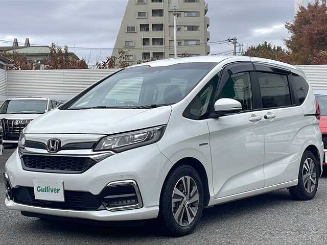 ホンダ フリード＋ ハイブリット G ホンダセンシング 東京都 2020(令2)年 3.7万km プラチナホワイトパール ワンオーナー/純正メモリナビ/（フルセグ/BT/CD/DVD/FM/AM）/アダプティブクルーズコントロール/車線維持支援システム/衝突軽減ブレーキ/誤発進抑制機能/両側パワースライドドア/コーナーセンサー/ハーフレザーシート/シートヒーター（D/N）/ミラーヒーター/スマートキー/ドライブレコーダー（前後）/ETC