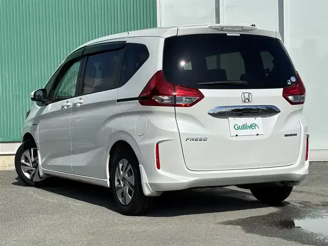 ホンダ フリード ハイブリット G ホンダセンシング 福岡県 2016(平28)年 9.2万km ホワイトオーキッドパール プッシュスタートボタン/スマートキー/クルーズコントロール/前方ドライブレコーダー/純正フロアマット/両側パワースライドドア/LEDヘッドライト/衝突軽減ブレーキ/Bluetoothオーディオ/バックカメラ/純正フロアマット