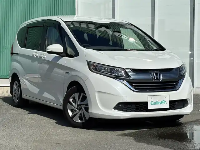 ホンダ フリード ハイブリット G ホンダセンシング 福岡県 2016(平28)年 9.2万km ホワイトオーキッドパール プッシュスタートボタン/スマートキー/クルーズコントロール/前方ドライブレコーダー/純正フロアマット/両側パワースライドドア/LEDヘッドライト/衝突軽減ブレーキ/Bluetoothオーディオ/バックカメラ/純正フロアマット