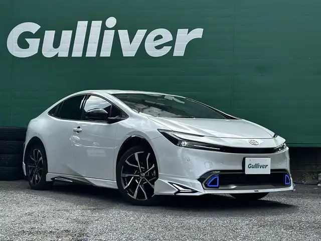 トヨタ プリウス Z 東京都 2023(令5)年 1.5万km プラチナホワイトパールマイカ ワンオーナー/モデリスタエアロ/デジタルインナーミラー/12.3型純正ナビ/(AM/FM/USB/BT/フルセグTV)/パノラミックビューモニター/ブラインドスポットモニター/Toyota Safety Sense/・衝突軽減ブレーキ/・レーダークルーズコントロール/・車線逸脱防止機能/トヨタチームメイト/・パーキングサポートブレーキ/前後ドライブレコーダー/運転席メモリ付パワーシート/前席シートヒータ/エアシート/純正19インチアルミ/ステアリングヒーター/スペアキー/ETC2.0/取扱説明書
