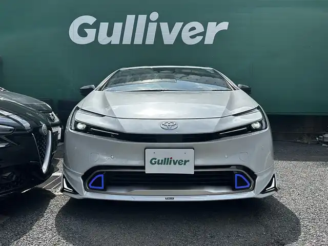 トヨタ プリウス Z 東京都 2023(令5)年 1.5万km プラチナホワイトパールマイカ ワンオーナー/モデリスタエアロ/デジタルインナーミラー/12.3型純正ナビ/(AM/FM/USB/BT/フルセグTV)/パノラミックビューモニター/ブラインドスポットモニター/Toyota Safety Sense/・衝突軽減ブレーキ/・レーダークルーズコントロール/・車線逸脱防止機能/トヨタチームメイト/・パーキングサポートブレーキ/前後ドライブレコーダー/運転席メモリ付パワーシート/前席シートヒータ/エアシート/純正19インチアルミ/ステアリングヒーター/スペアキー/ETC2.0/取扱説明書