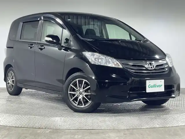 ホンダ フリード G ジャストセレクション 神奈川県 2013(平25)年 3万km プレミアムスパークルブラックパール 社外9型メモリーナビゲーション【AVN-ZX02i】/フルセグ　SD　CD DVD/フリップダウンモニター/両側電動スライドドア/シートリフター/社外ETC/プッシュスタート/スマートキー/社外15インチアルミホイール/HIDヘッドライト/オートライト/スペアキー