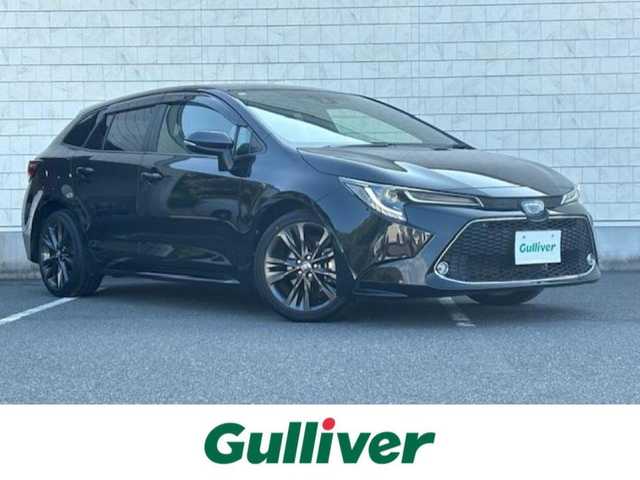 トヨタ カローラツーリング ハイブリッド ダブルバイビー 大阪府 2021(令3)年 4.4万km ブラックマイカ 純正9型ディスプレイオーディオナビ/バックカメラ/フルセグ/ブラインドスポットモニター/トヨタセーフティセンス/シートヒーター/ステアリングヒーター/ハーフレザーシート/純正アルミホイール/ビルトインETC/LEDヘッドライト/プッシュスタート/スマートキー