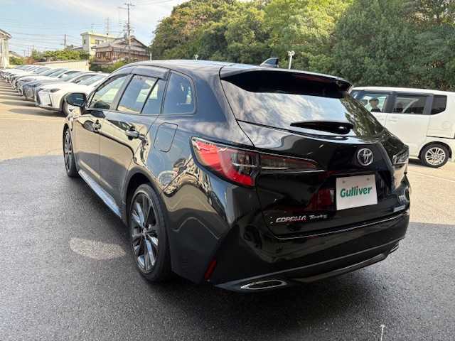 トヨタ カローラツーリング ハイブリッド ダブルバイビー 大阪府 2021(令3)年 4.4万km ブラックマイカ 純正9型ディスプレイオーディオナビ/バックカメラ/フルセグ/ブラインドスポットモニター/トヨタセーフティセンス/シートヒーター/ステアリングヒーター/ハーフレザーシート/純正アルミホイール/ビルトインETC/LEDヘッドライト/プッシュスタート/スマートキー