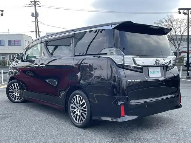 トヨタ ヴェルファイア Z Gエディション 鳥取県 2016(平28)年 6.6万km バーニングブラッククリスタルシャインガラスフレーク 純正10インチナビ/フルセグ/CD/DVD/BT/バックカメラ/純正フリップダウンモニター/ビルトインETC/ブラックレザーシート/前席パワーシート/メモリ機能付き/前席シートヒーター/ステアリングヒーター/両側パワースライドドア/パワーバックドア/クリアランスソナー/LEDヘットライト/純正18インチアルミホイール/プッシュエンジンスタート/スペアキー/フロアマット・ドアバイザー