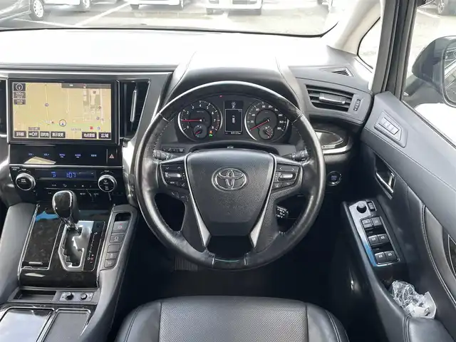 トヨタ ヴェルファイア Z Gエディション 鳥取県 2016(平28)年 6.6万km バーニングブラッククリスタルシャインガラスフレーク 純正10インチナビ/フルセグ/CD/DVD/BT/バックカメラ/純正フリップダウンモニター/ビルトインETC/ブラックレザーシート/前席パワーシート/メモリ機能付き/前席シートヒーター/ステアリングヒーター/両側パワースライドドア/パワーバックドア/クリアランスソナー/LEDヘットライト/純正18インチアルミホイール/プッシュエンジンスタート/スペアキー/フロアマット・ドアバイザー