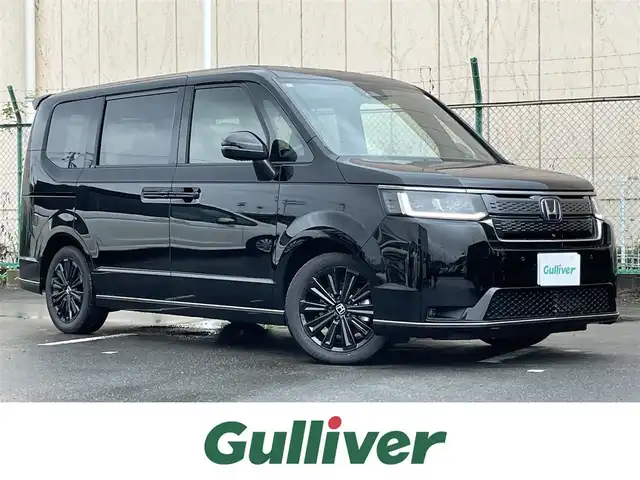 ホンダ ステップワゴン スパーダ eHEV プレミアムライン ブラックED 東京都 2025(令7)年 0.1千km クリスタルブラックパール 登録済み使用車/HondaSENSING /（安全運転支援システム）/・衝突軽減ブレーキ/・渋滞追従機能付アダプティブクルーズコントロール/・歩行者事故低減ステアリング/・車線維持支援システム/・先行車発進お知らせ機能/・オートハイビーム/・標識認識機能/パワーバックドア /両側パワースライドドア /アダプティブLEDヘッドライト /ブラインドスポットモニター/ 後退時ブレーキサポート /全列USBチャージ /トリプルゾーンコントロール /２列目キャプテンシート/スマートキー/保証書＆取説