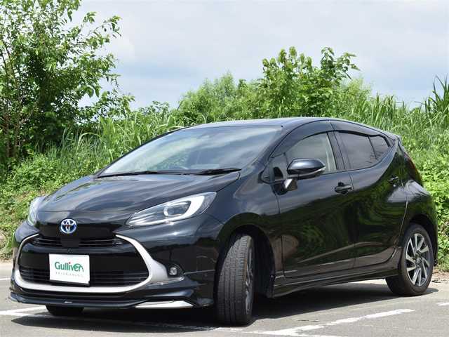 トヨタ アクア Z 福岡県 2021(令3)年 4.1万km ブラックマイカ 純正ディスプレイオーディ/スマートキー/プッシュスタート/パノラマビューカメラ/トヨタセーフティセンス/　・PCS（プリクラッシュセーフティ）/　・LTA（レーントレーシングアシスト）/　・AHB（オートマチックハイビーム）/　・RSA（ロードサインアシスト）/　・レーダークルーズコントロール/　・先行車発進告知機能/ブラインドスポットモニター/運転席パワーシート/純正LEDヘッドライト/純正16インチアルミ/革巻きステアリング/ステアリングスイッチ/モデリスタF/S/Rエアロ/ステアリングヒーター/電動格納ミラー/ETC2．0/保証書/取扱説明書