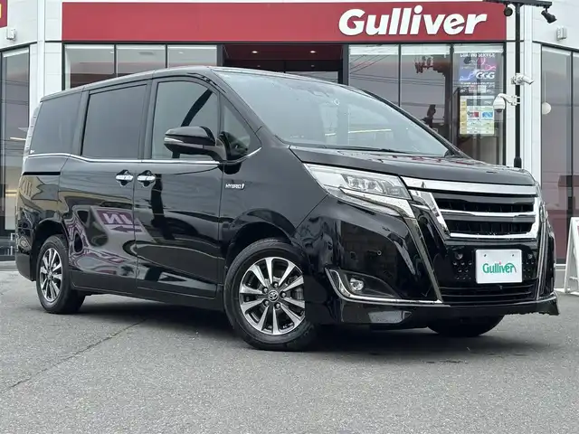 トヨタ エスクァイア ハイブリッド Gi プレミアムパッケージ ブラックテーラード 宮城県 2019(令1)年 5.9万km ブラック 禁煙車アルパイン11インチナビCD/DVD/BT/HDMI/フルセグテレビバックカメラアルパイン１１インチフリップダウントヨタセーフティセンスプリクラッシュセーフティー/オートハイビームクリアランスソナークルーズコントロール/シートヒーター（F/R）ハーフレザーシート/ステアリングリモコンウッドコンビステアリング/LEDライトLEDフォグETCドアバイザー