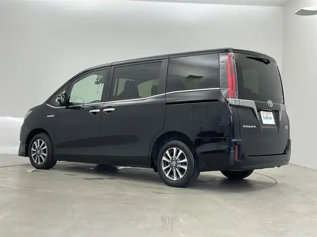 トヨタ エスクァイア ハイブリッド Gi プレミアムパッケージ ブラックテーラード 埼玉県 2019(令1)年 5.9万km ブラック アルパイン11インチナビ/フルセグテレビ/CD/DVD/BT/HDMI/バックカメラ/ETC/アルパイン11インチフリップダウン/クルーズコントロール/トヨタセーフティセンス/プリクラッシュセーフティー/LEDライト/LEDフォグ/オートハイビーム/クリアランスソナー/ハーフレザーシート/シートヒーター（F/R）/ステアリングリモコン/ウッドコンビステアリング