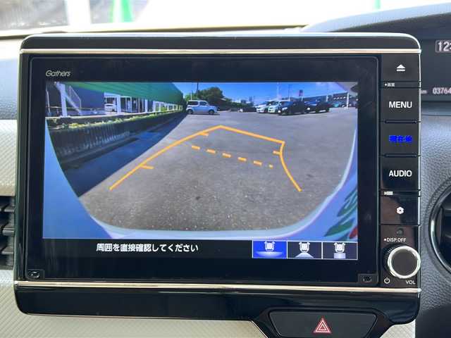 ホンダ Ｎ ＢＯＸ L ターボ 茨城県 2021(令3)年 3.8万km プラチナホワイトパール 衝突被害軽減システム/横滑り防止装置/コーナーセンサー/レーンキープアシスト/サイドエアバッグ/カーテンエアバッグ/8インチ純正SDナビ(Bluetooth/バックカメラ/AppleCarPlay/フルセグTV)/ドライブレコーダー/両側パワースライドドア/レーダークルーズコントロール/LEDオートライト/シートヒーター/ベンチシート/純正フロアマット/純正14インチアルミホイール/パドルシフト/アイドリングストップ/USB入力端子/スマートキー