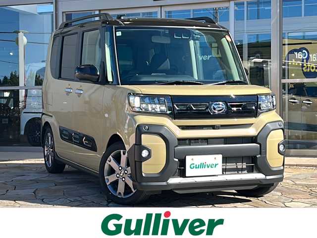 ダイハツ タント ファンクロスターボ 静岡県 2023(令5)年 1.2万km ブラックマイカメタリック/サンドベージュメタリック 社外メモリナビ/・CD/・DVD/・フルセグＴＶ/・Bluetooth/・AM/・FM/主要装備/・両側パワスラ/・衝突軽減/・レーンキープ/・コーナーセンサー前後/・バックカメラ/・ETC/・ドラレコ前/・シートヒーターD/N席/・ステリモ/・電動パーキングブレーキ/・オートホールド/・LEDヘッドライト/・オートライト/・オートハイビーム/・フォグランプ/・社外フロアマット/・純正フアルミホイール/・スペアキー1本