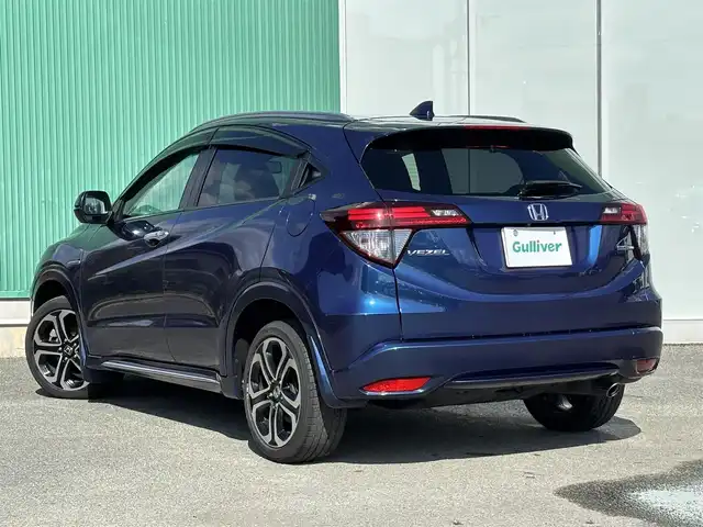 ホンダ ヴェゼル ハイブリッド 福岡県 2016(平28)年 8万km 青 純正ナビ(ワンセグテレビ・CD・DVD・BT)/・VXM-174VFi/バックカメラ/ETC/純正アルミホイール/前席シートヒーター/プッシュスタート/社外フロアマット/スマートキー