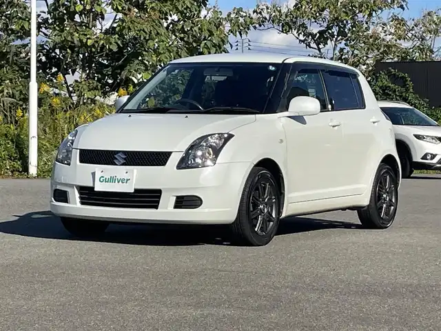 スズキ スイフト XG LTDⅡ 山形県 2006(平18)年 11.3万km パールホワイト 4WD/カーオーディオ/　　【CD　MD　FM/AM】/シートヒーター/15インチアルミホイール/純正フロアマット/電動格納ミラー/ステアリングスイッチ/ヘッドライトレベライザー/ドアバイザー/AAC/スマートキー