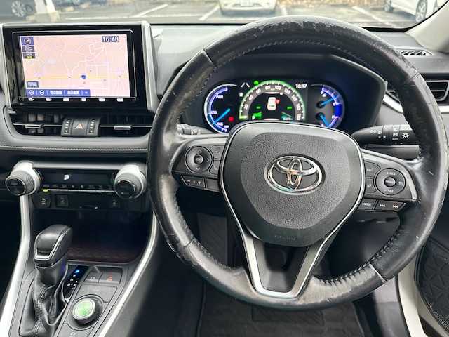 トヨタ ＲＡＶ４ ハイブリッドG 茨城県 2019(令1)年 8.4万km ホワイトパールクリスタルシャイン 純正９インチナビ/～フルセグTV/BT/CD/FM/AM～/TVキャンセラー/バックカメラ/パワーバックドア/ルーフレール/ステアリングヒーター/前席シートヒーター/運転席パワーシート/ETC/オートマチックハイビーム/レーダークルーズコントロール/レーントレーシングアシスト/ドライブレコーダー