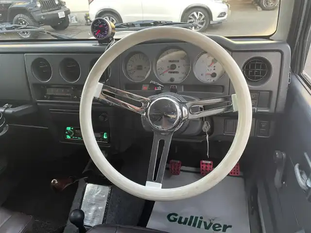 スズキ ジムニー ワイルドウィンド 和歌山県 1996(平8)年 17.2万km グレー 社外バンパー/社外マフラー/社外ステアリング/社外ホイール/社外シフトノブ/社外CD・Bluetooth・USB/社外LEDヘッドライト/HKSエアクリーナー/社外ブローオフバルブ/社外レザー調シートカバー