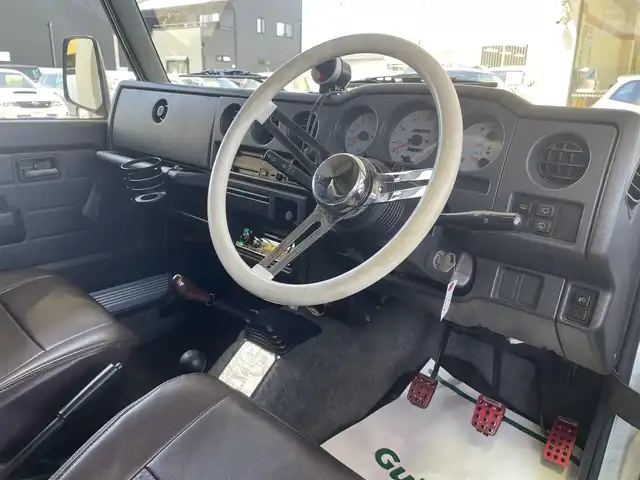 スズキ ジムニー ワイルドウィンド 和歌山県 1996(平8)年 17.2万km グレー 社外バンパー/社外マフラー/社外ステアリング/社外ホイール/社外シフトノブ/社外CD・Bluetooth・USB/社外LEDヘッドライト/HKSエアクリーナー/社外ブローオフバルブ/社外レザー調シートカバー