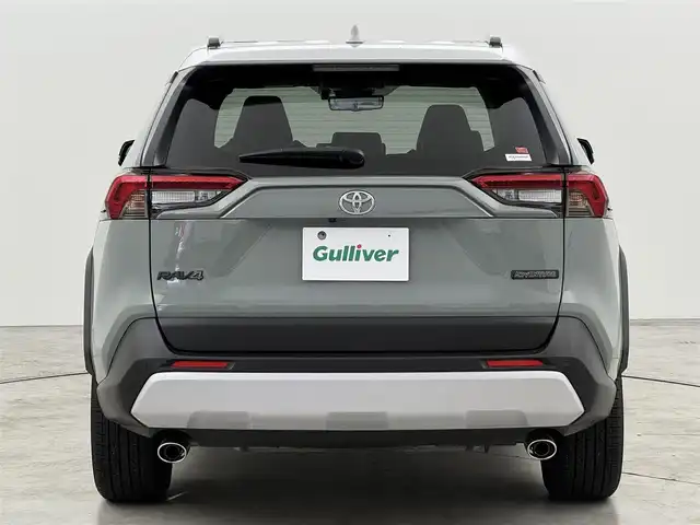 トヨタ ＲＡＶ４ アドベンチャー 福岡県 2023(令5)年 1.4万km アッシュグレーメタリック/アーバンカーキ ワンオーナー　/パノラマムーンルーフ　/純正１０．５型ＤＡナビ/フルセグTV　/バックカメラ　/デジタルルームミラー　/ビルトインETC２．０　/トヨタセーフティセンス　/レーダークルーズコントロール　/コーナーセンサー　/衝突軽減ブレーキ　/レーンキープ　/ブラインドスポットモニター　/アクセル踏み間違い防止　/ヒルディセントコントロール　/ハーフレザーシート　/シートメモリー付きパワーシート　/シートベンチレーション／ヒーター　/ステアリングヒーター　/パワーバックドア　/純正１９インチアルミホイール