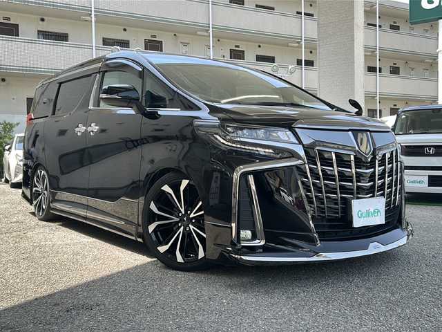 トヨタ アルファード S タイプゴールド 兵庫県 2020(令2)年 1.7万km ブラック ワンオーナー/純正メーカーナビ/　Bluetooth/CD/USB/DVD/AM/FM/純正ビルトインETC/フルセグテレビ（走行中視聴不可）/ドライブレコーダー（前後）/純正後席用モニター/両側パワースライドドア/3列シート/オットマン/電動リアゲート/ウォークスルー/プッシュスタート/パワーステアリング/MTモード付AT/アダプティブクルーズコントロール/パーキングアシスト/アンチロック・ブレーキ・システム/横滑り防止装置/レーンキープアシスト/コーナーセンサー（前後）/バックカメラ/社外エアロパーツ（モデリスタ）/社外アルミホイール（モデリスタ）/社外マフラー（モデリスタ）/社外サスペンション（モデリスタ）/　【純正サスペンション付き】/エアバッグ（W+サイド）/カーテンエアバッグ/LEDヘッドライト/衝突軽減システム/保証書/取扱説明書