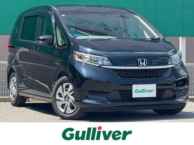 ホンダ フリード ハイブリット G ホンダセンシング 千葉県 2020(令2)年 6.7万km クリスタルブラックパール 純正SDナビ(フルセグTV/CD/DVD/Bluetooth)/両側パワースライドドア/レーダークルーズコントロール/ホンダセンシング/バックカメラ/ビルトインETC/純正LEDヘッドライト/純正フロアマット/オートライト/ステアリングスイッチ/スマートキー/プッシュエンジンスタート