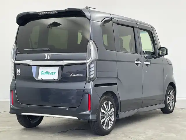 ホンダ Ｎ ＢＯＸ カスタム L 新潟県 2022(令4)年 4.7万km メテオロイドグレーメタリック ホンダセンシング/　●衝突軽減ブレーキ（CMBS）/　●誤発進抑制機能/　●歩行者事故低減ステアリング/　●路外逸脱抑制機能/　●アダプティブクルーズコントロール（ACC）/　●車線維持支援システム（LKAS）/　●先行車発進お知らせ機能/　●標識認識機能/　●後方誤発進抑制機能/　●オートハイビーム/純正ディーラーOPナビ/ステアリングスイッチ/片側パワースライドドア/バックカメラ/オートライト/LEDヘッドライト/電動格納ミラー/ウィンカーミラー/シートヒーター/リアサンシェード/ヘッドライトレベライザー/フロントフォグランプ/シーケンシャルウィンカー/ドアバイザー
