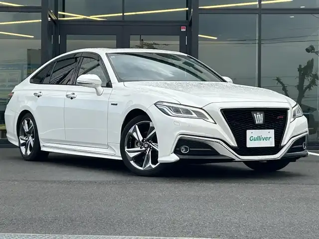 トヨタ クラウン ハイブリッド RS アドバンス 愛媛県 2019(令1)年 6.4万km ホワイトパールクリスタルシャイン 純正ナビ(フルセグTV/BT)/バックカメラ/トヨタセーフティセンス/レーダークルーズコントロール/衝突被害軽減装置/車線逸脱防止装置/ブラインドスポットモニター/クリアランスソナー/ヘッドアップディスプレイ/前席パワーシート/シートヒーター/運転席シートメモリー機能/デジタルインナーミラー/パドルシフト/LEDヘッドライト/オートライト/オートマチックハイビーム/100V/100Wコンセント/電動チルト＆テレスコピック機構/ETC2.0/現状サマー(純正AW)(225/45/R18)/BRIDGESTONE REGNO GR-XII