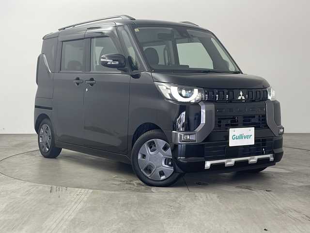 三菱 デリカミニ G 兵庫県 2023(令5)年 0.3万km アメジストブラック ・e-Assist/・衝突被害軽減ブレーキシステム［FCM］（歩行者検知付）/・踏み間違い衝突防止アシスト［EAPM］/・車線逸脱警報システム［LDW］/・車線逸脱防止支援機能［LDP］/・オートマチックハイビーム［AHB］/・ふらつき警報［DAA］/・前方衝突予測警報［PFCW］/・標識認識システム［TSR］/・先行車発進通知［LCDN］/・運転席SRSニーエアバッグ/・純正ナビ＆フルセグ＆DVD＆BT/・助手席側電動スライドドア（イージークローザー付、ハンズフリーオートスライドドア）/・運転席側スライドドア（イージークローザー付）/・リヤビューモニター付ルームミラー（自動防眩機能付）/・LEDヘッドライト（光軸調整機構付）/・LEDフロントフォグランプ/・マルチインフォメーションディスプレイ（カラー液晶、グリップコントロール表示）/・ETC/・前後ドライブレコーダー/・アイドリングストップ/・前後コーナーセンサー/・ルーフレール/・純正フロアマット/・スマートキー/・プッシュスタート/・撥水シート生地（合成皮革＆ファブリック）/・ステアリングスイッチ