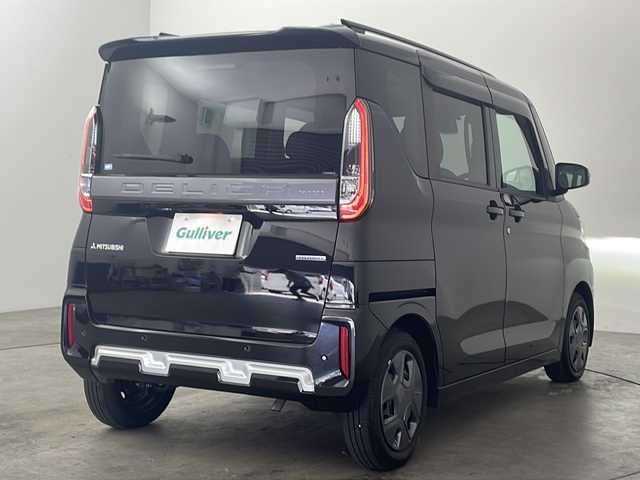 三菱 デリカミニ G 兵庫県 2023(令5)年 0.3万km アメジストブラック ・e-Assist/・衝突被害軽減ブレーキシステム［FCM］（歩行者検知付）/・踏み間違い衝突防止アシスト［EAPM］/・車線逸脱警報システム［LDW］/・車線逸脱防止支援機能［LDP］/・オートマチックハイビーム［AHB］/・ふらつき警報［DAA］/・前方衝突予測警報［PFCW］/・標識認識システム［TSR］/・先行車発進通知［LCDN］/・運転席SRSニーエアバッグ/・純正ナビ＆フルセグ＆DVD＆BT/・助手席側電動スライドドア（イージークローザー付、ハンズフリーオートスライドドア）/・運転席側スライドドア（イージークローザー付）/・リヤビューモニター付ルームミラー（自動防眩機能付）/・LEDヘッドライト（光軸調整機構付）/・LEDフロントフォグランプ/・マルチインフォメーションディスプレイ（カラー液晶、グリップコントロール表示）/・ETC/・前後ドライブレコーダー/・アイドリングストップ/・前後コーナーセンサー/・ルーフレール/・純正フロアマット/・スマートキー/・プッシュスタート/・撥水シート生地（合成皮革＆ファブリック）/・ステアリングスイッチ