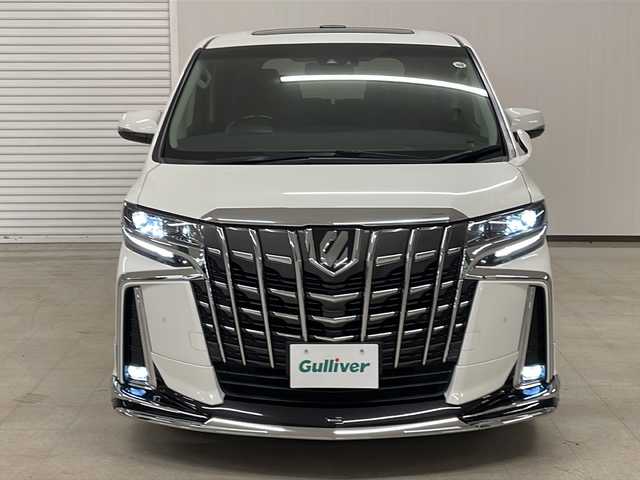 トヨタ アルファード S Cパッケージ 熊本県 2020(令2)年 8.9万km ホワイトパールクリスタルシャイン モデリスタエアロ(F/S/R)/ツインムーンルーフ/純正ディスプレイオーディオ/（ラジオ、フルセグ、BT、USB、HDMI）/純正後席用フリップダウンモニター/バックカメラ/両側パワースライドドア/トヨタセーフティセンス/・レーンキープアシスト/・プリクラッシュセーフティ/・ハイビームアシスト/・レーダークルーズコントロール/ETC/ステアリングリモコン/ハンドルヒーター/シートヒーター/エアーシート/オートライト/横滑り防止/シートメモリー/パワーシート/フロアマット/オットマン/プッシュスタート/スマートキー×2