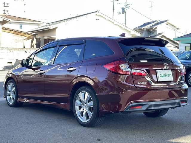 ホンダ ジェイド ハイブリッド X 愛媛県 2015(平27)年 8.9万km プレミアムディープロッソパール 純正ナビ/バックカメラ/ETC/ワンセグテレビ/Bluetooth接続/ワンオーナー/純正フロアマット/３列シート/ドライブレコーダー/ハーフレザーシート/レーンキープアシスト/衝突被害軽減システム/２列目エアコン/アイドリングストップ/純正アルミホイール/スマートキー/オートライト