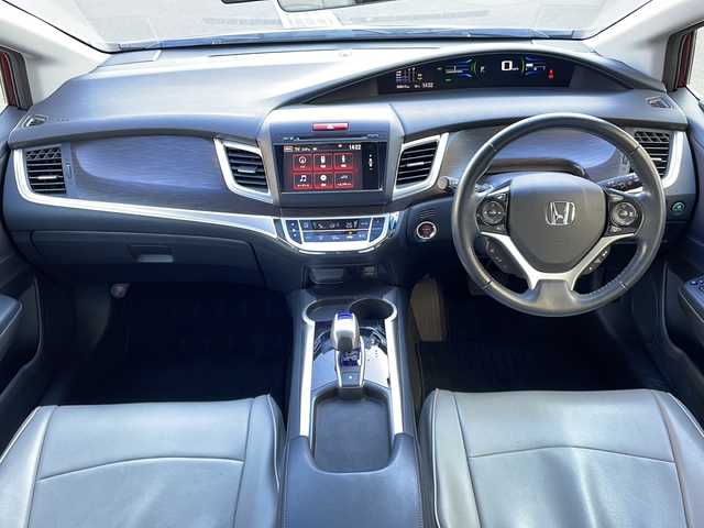 ホンダ ジェイド ハイブリッド X 愛媛県 2015(平27)年 8.9万km プレミアムディープロッソパール 純正ナビ/バックカメラ/ETC/ワンセグテレビ/Bluetooth接続/ワンオーナー/純正フロアマット/３列シート/ドライブレコーダー/ハーフレザーシート/レーンキープアシスト/衝突被害軽減システム/２列目エアコン/アイドリングストップ/純正アルミホイール/スマートキー/オートライト